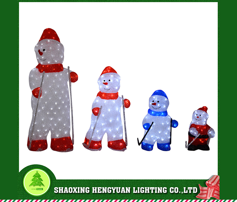 Big, medium and small skiing snowmen